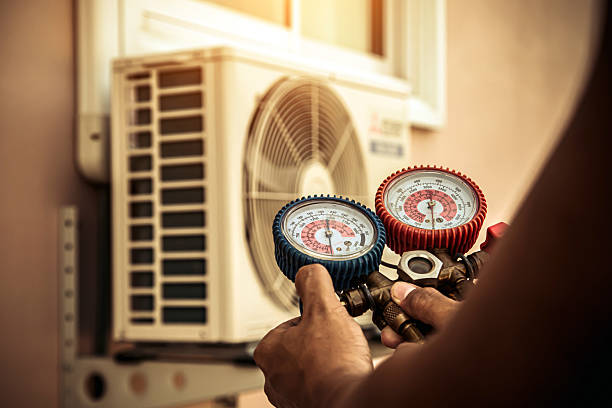 Professional Hvac Repair technician working in Elmwood, MA